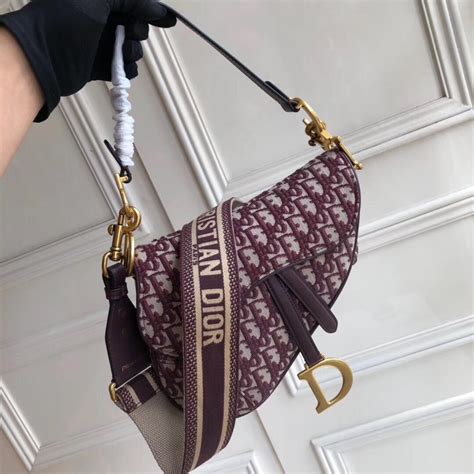 dior tasche saddle fake|knockoff Dior buckle bag.